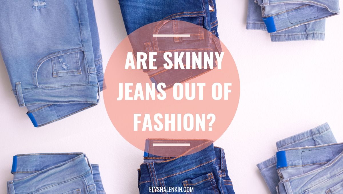 Are skinny jeans out of fashion. Blue jeans folded next to each other.