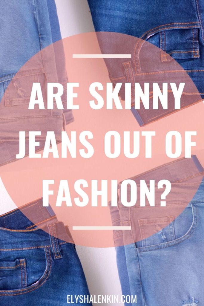 Are skinny jeans out of fashion. Blue jeans folded next to each other.